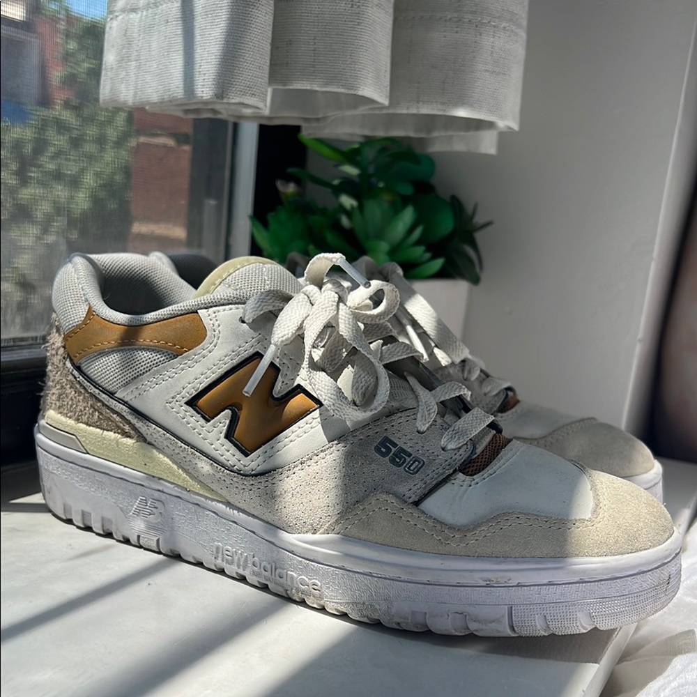 New Balance 550 Sneakers in White and Gold